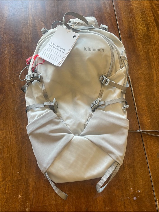 Handbags - NWT lululemon All Sport Backpack 10L Vapor Silver Running Hiking Bike Bag